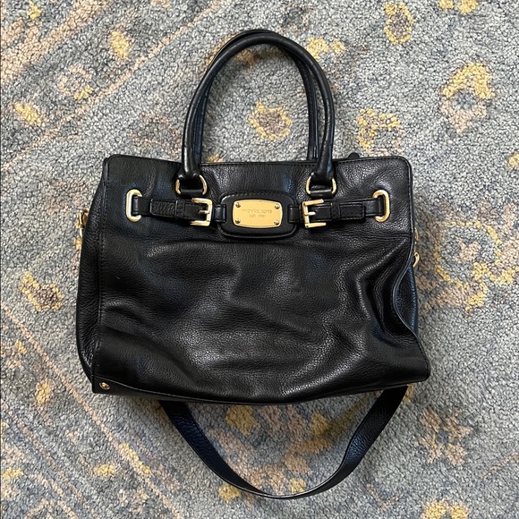 Michael Kors Handbags - Michael Kors black purse with gold hardware